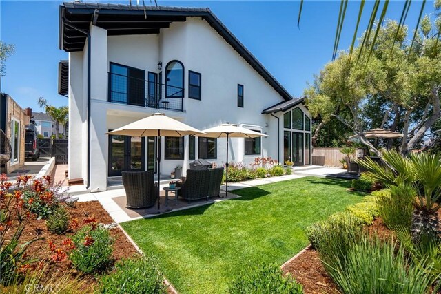 433 Emerald Bay Dr, Arroyo Grande, CA 93420 - back of property featuring a balcony, stucco siding, a patio, and outdoor lounge area