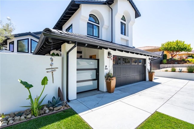 433 Emerald Bay Dr, Arroyo Grande, CA 93420 - view of front of house featuring stucco siding, driveway, and a garage