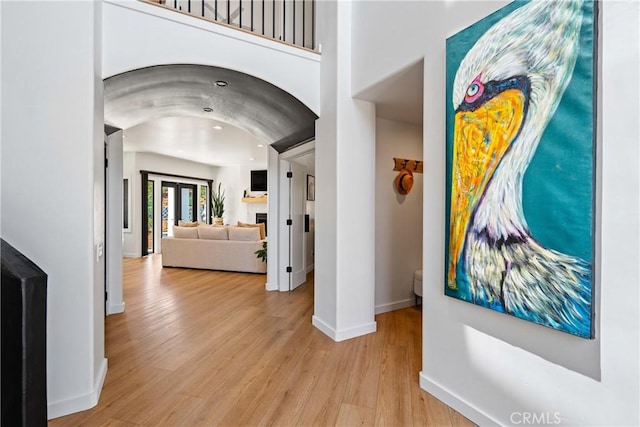 433 Emerald Bay Dr, Arroyo Grande, CA 93420 - corridor with wood finished floors, arched walkways, and recessed lighting