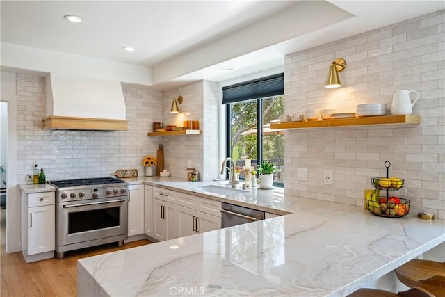 433 Emerald Bay Dr, Arroyo Grande, CA 93420 - kitchen featuring stainless steel appliances, custom exhaust hood, open shelves, light stone counters, and tasteful backsplash