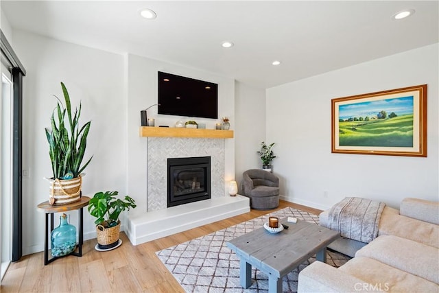 433 Emerald Bay Dr, Arroyo Grande, CA 93420 - living area with a fireplace, wood finished floors, and recessed lighting