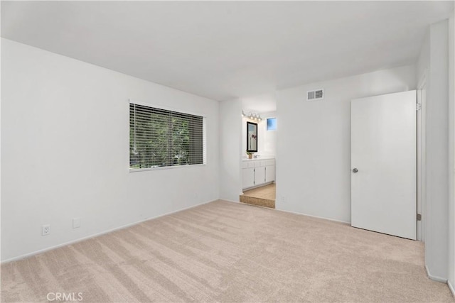 18 Denver Unit 71, Irvine, CA 92604 - unfurnished room featuring light carpet