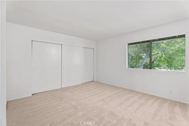 18 Denver Unit 71, Irvine, CA 92604 - unfurnished bedroom with carpet flooring and a closet
