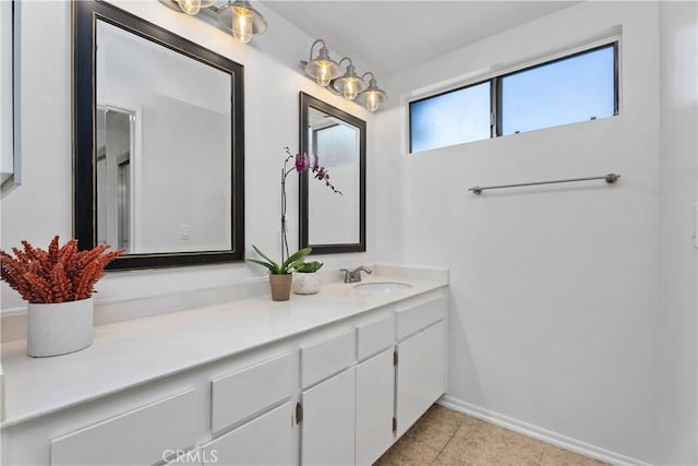 18 Denver Unit 71, Irvine, CA 92604 - bathroom with vanity and tile patterned flooring
