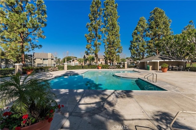 18 Denver Unit 71, Irvine, CA 92604 - community pool featuring a patio