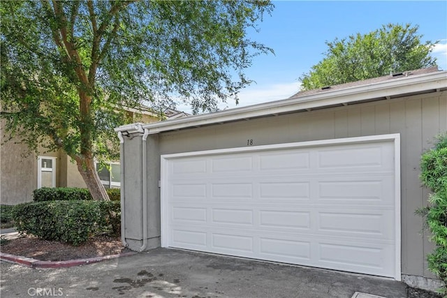 18 Denver Unit 71, Irvine, CA 92604 - garage featuring driveway