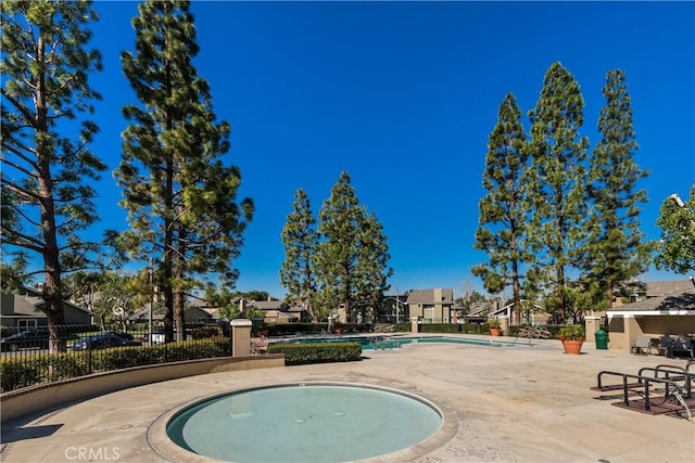 18 Denver Unit 71, Irvine, CA 92604 - community pool with a patio area and a residential view