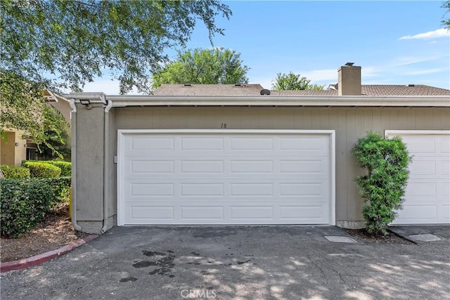 18 Denver Unit 71, Irvine, CA 92604 - garage with driveway