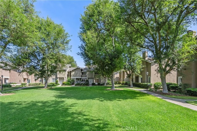 18 Denver Unit 71, Irvine, CA 92604 - view of community featuring a residential view and a lawn