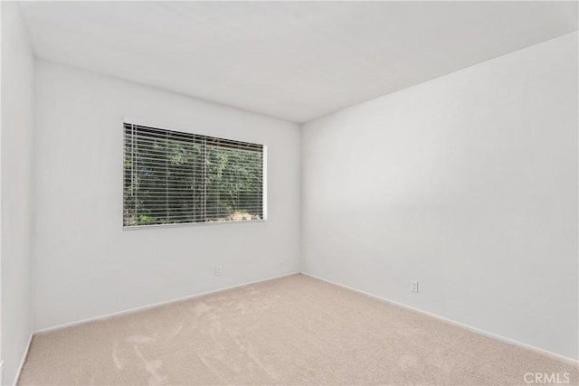 18 Denver Unit 71, Irvine, CA 92604 - spare room with light colored carpet and baseboards