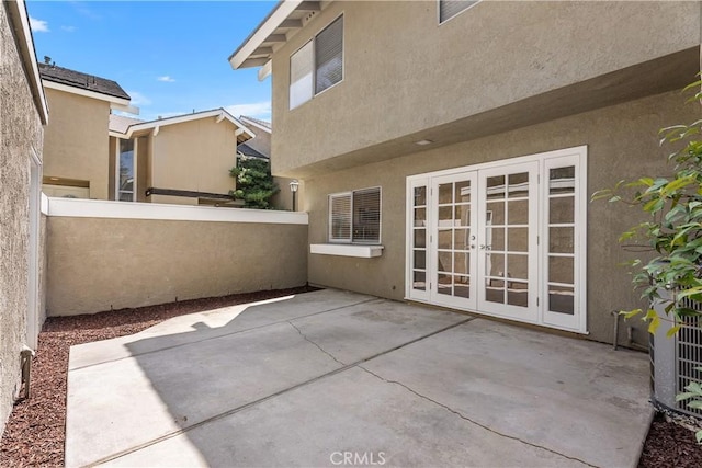 18 Denver Unit 71, Irvine, CA 92604 - view of patio / terrace with french doors