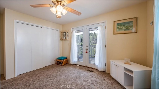 448 Delle Dr, Crestline, CA 92325 - doorway featuring light colored carpet, french doors, and a ceiling fan