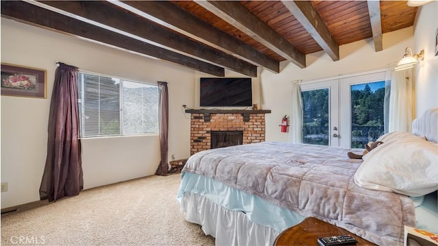 448 Delle Dr, Crestline, CA 92325 - carpeted bedroom with french doors, a wooden ceiling with exposed beams, and a fireplace