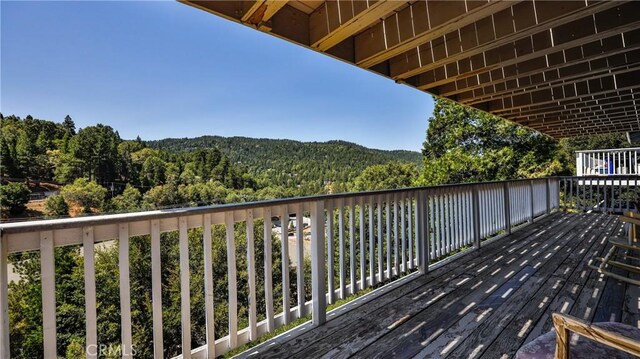 448 Delle Dr, Crestline, CA 92325 - deck featuring a forest view