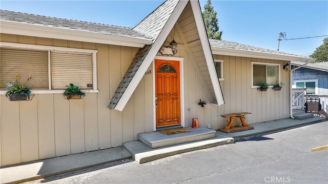 448 Delle Dr, Crestline, CA 92325 - property entrance featuring a shingled roof