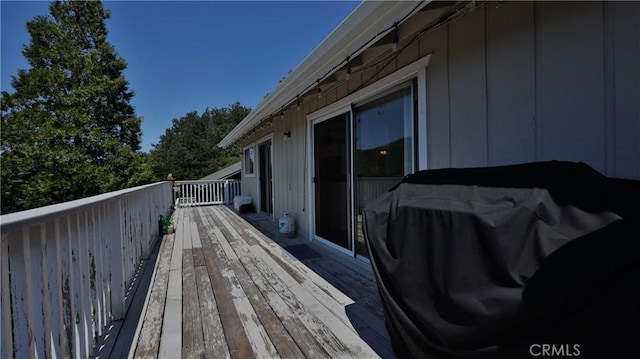 448 Delle Dr, Crestline, CA 92325 - wooden deck with grilling area