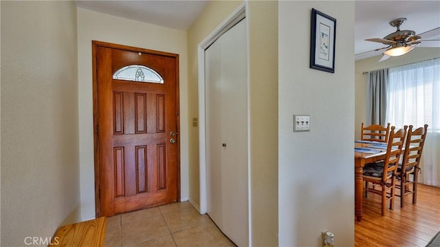 448 Delle Dr, Crestline, CA 92325 - entryway with plenty of natural light, ceiling fan, and light tile patterned flooring