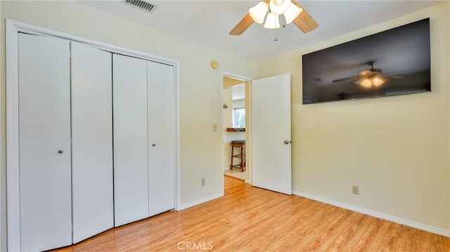 448 Delle Dr, Crestline, CA 92325 - unfurnished bedroom featuring wood finished floors, a closet, and ceiling fan