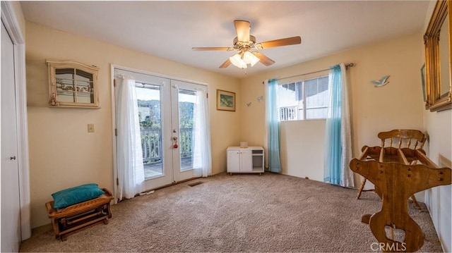 448 Delle Dr, Crestline, CA 92325 - entryway featuring french doors, carpet floors, and ceiling fan