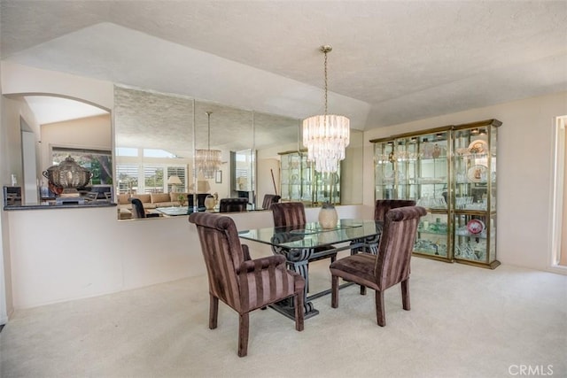 31781 National Park Dr, Laguna Niguel, CA 92677 - dining room with a chandelier, carpet floors, and arched walkways