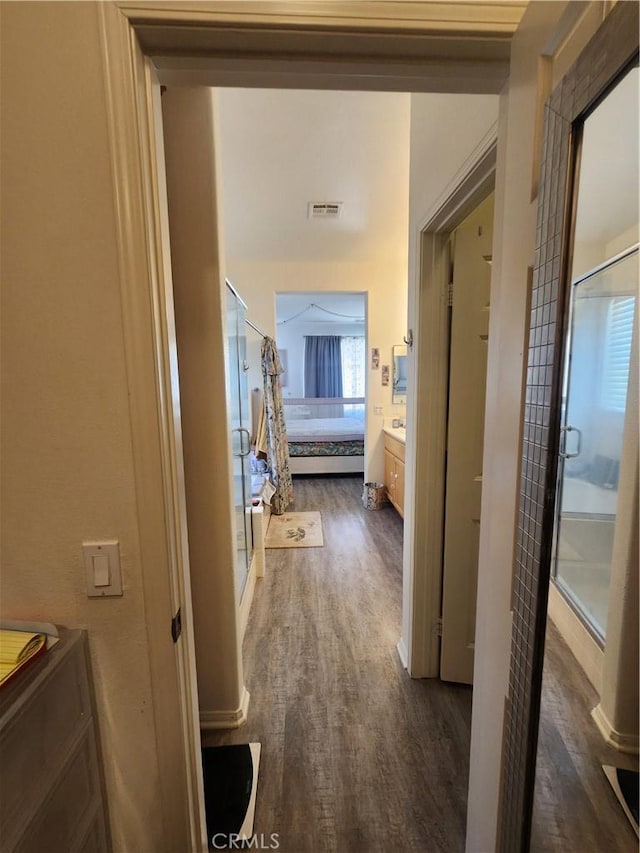 37882 Lopez Ln, Palmdale, CA 93552 - corridor with dark wood finished floors