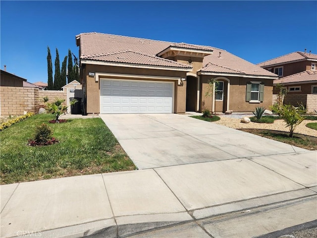37882 Lopez Ln, Palmdale, CA 93552 - mediterranean / spanish house featuring stucco siding, a tile roof, an attached garage, and concrete driveway