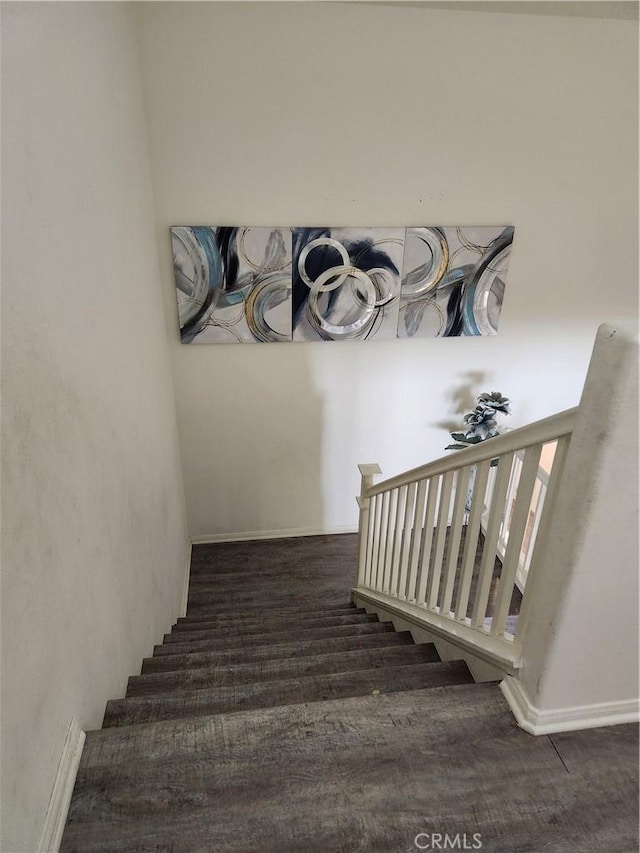 37882 Lopez Ln, Palmdale, CA 93552 - staircase with wood finished floors and baseboards