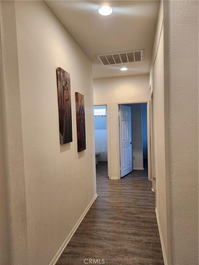 37882 Lopez Ln, Palmdale, CA 93552 - hallway with baseboards and dark wood finished floors