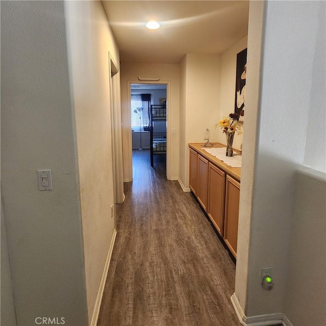 37882 Lopez Ln, Palmdale, CA 93552 - hall featuring dark wood-type flooring and baseboards