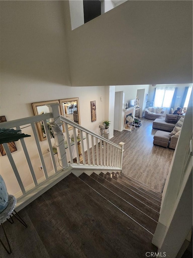 37882 Lopez Ln, Palmdale, CA 93552 - staircase featuring wood finished floors and a high ceiling