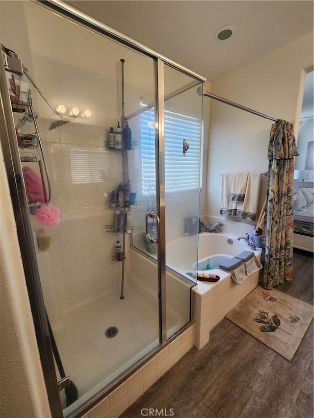 37882 Lopez Ln, Palmdale, CA 93552 - full bath with a stall shower, wood finished floors, and a bath