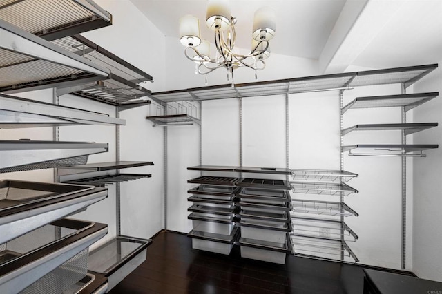 1415 Rex Ln, El Cajon, CA 92021 - spacious closet featuring dark wood-type flooring and a chandelier