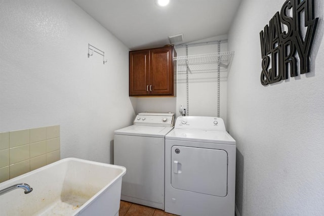 1415 Rex Ln, El Cajon, CA 92021 - washroom featuring separate washer and dryer, cabinet space, and tile patterned flooring