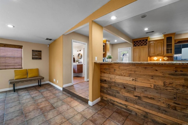 1415 Rex Ln, El Cajon, CA 92021 - kitchen featuring glass insert cabinets, recessed lighting, and brown cabinetry