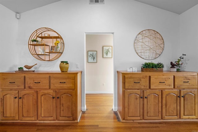 1415 Rex Ln, El Cajon, CA 92021 - hallway with light wood finished floors and vaulted ceiling