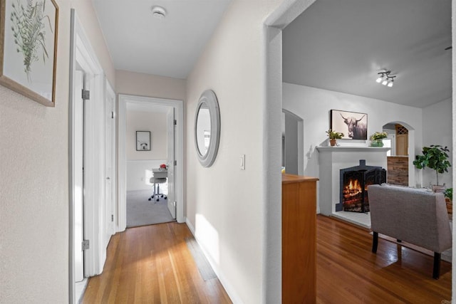 1415 Rex Ln, El Cajon, CA 92021 - hall featuring light wood-style floors and arched walkways