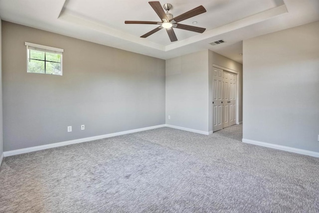 1440 Clearview Way, San Marcos, CA 92078 - unfurnished room featuring a tray ceiling, carpet flooring, and ceiling fan