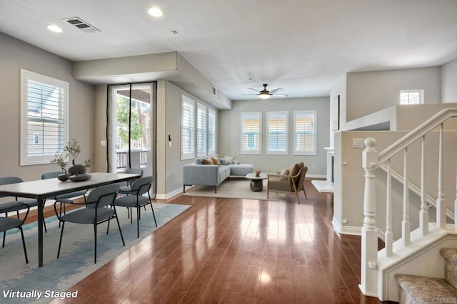 1440 Clearview Way, San Marcos, CA 92078 - dining room featuring healthy amount of natural light, wood finished floors, ceiling fan, stairs, and recessed lighting
