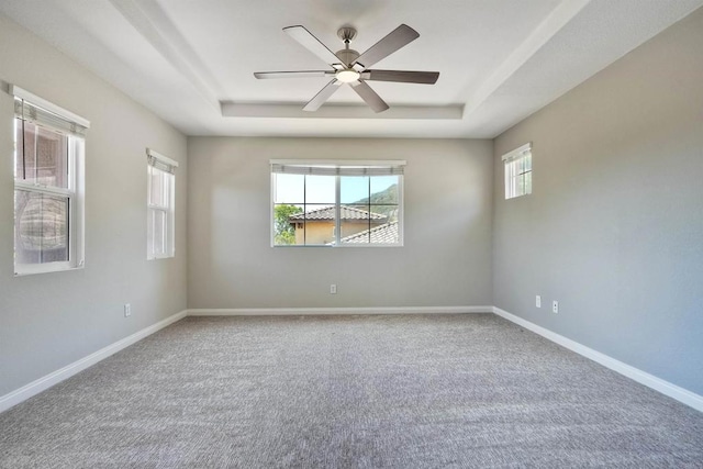 1440 Clearview Way, San Marcos, CA 92078 - empty room with a tray ceiling, carpet, and ceiling fan
