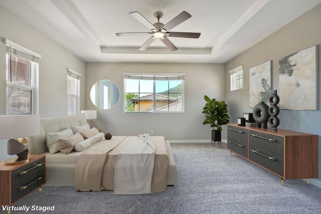 1440 Clearview Way, San Marcos, CA 92078 - carpeted bedroom featuring a tray ceiling and a ceiling fan