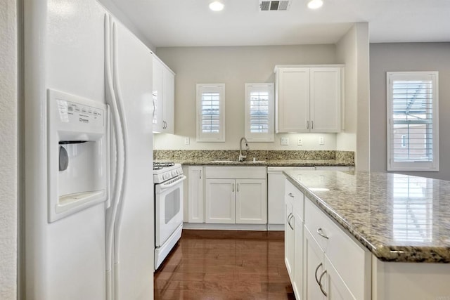 1440 Clearview Way, San Marcos, CA 92078 - kitchen featuring white appliances, plenty of natural light, white cabinets, light stone countertops, and recessed lighting