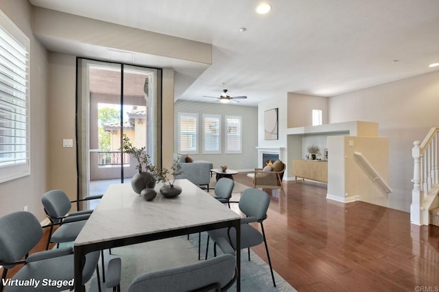 1440 Clearview Way, San Marcos, CA 92078 - dining space with a ceiling fan, wood finished floors, recessed lighting, and a glass covered fireplace