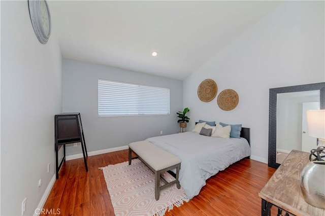 1755 Avenida Selva Unit 60, Fullerton, CA 92833 - bedroom featuring wood finished floors and vaulted ceiling