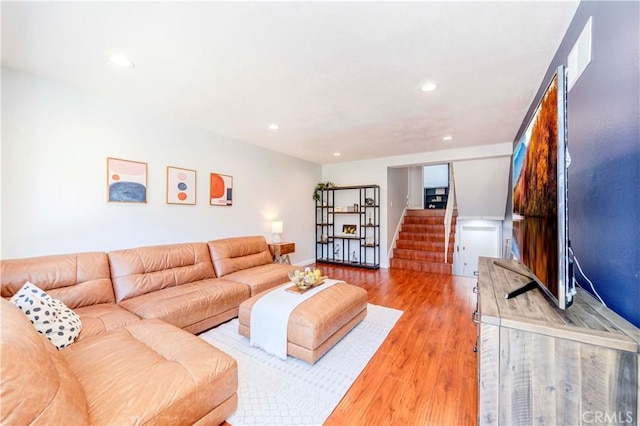 1755 Avenida Selva Unit 60, Fullerton, CA 92833 - living room with stairs, recessed lighting, and light wood-style flooring