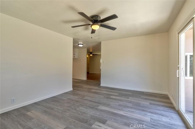 1101 Kensington Dr, Merced, CA 95340 - empty room featuring a ceiling fan and wood finished floors