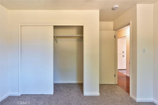 1101 Kensington Dr, Merced, CA 95340 - unfurnished bedroom featuring carpet flooring and a closet