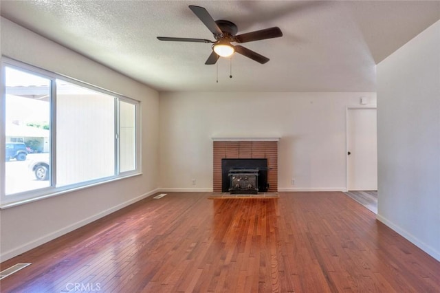 1101 Kensington Dr, Merced, CA 95340 - unfurnished living room with plenty of natural light, wood-type flooring, and ceiling fan