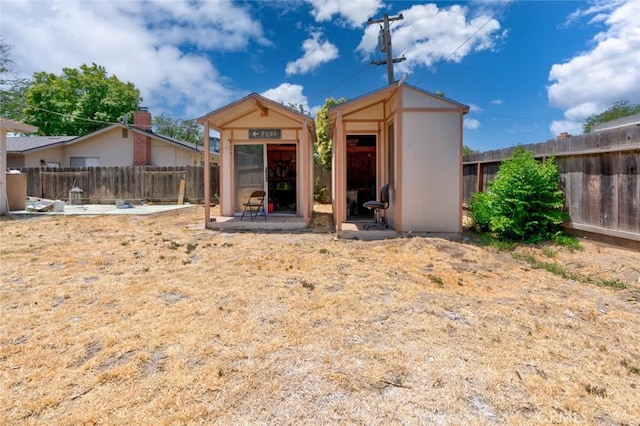 1101 Kensington Dr, Merced, CA 95340 - view of shed featuring a fenced backyard
