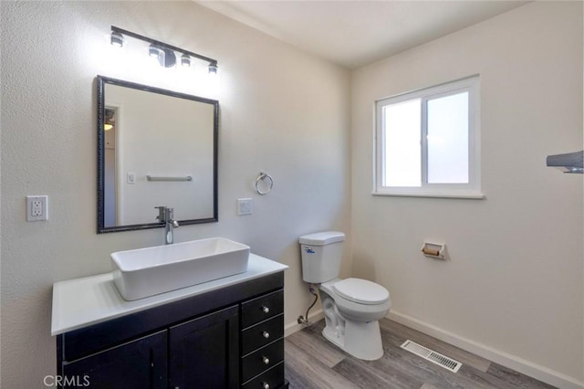 1101 Kensington Dr, Merced, CA 95340 - bathroom with wood finished floors and vanity