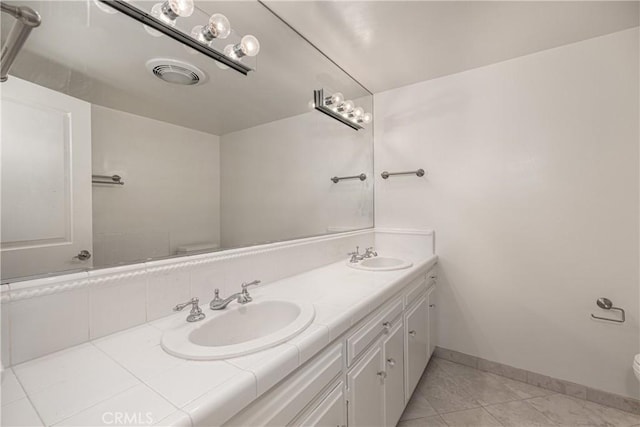 8 Via Subida, Rancho Palos Verdes, CA 90275 - bathroom with double vanity and tile patterned flooring
